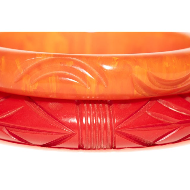 Vintage Carved Bakelite Bangle Bracelets in Red and Orange, 1930's, Pair Of For Sale In Miami - Image 6 of 17