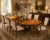 This EJ Victor dining table showcases exquisite craftsmanship, featuring a solid wood construction and a stunning...