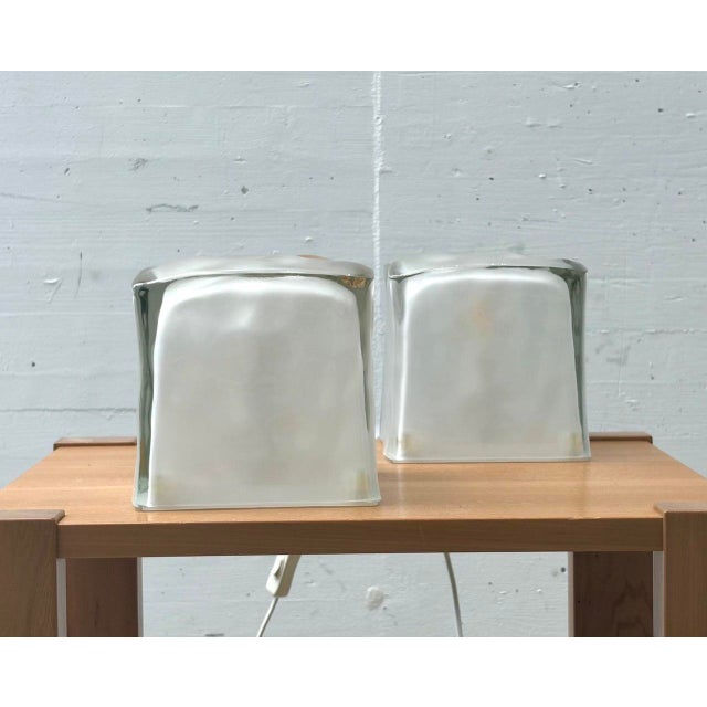 Striking, cube-shaped table lamps from ikea's iviken series, manufactured in the 1990s. Made of frosted glass with a...