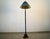 1970's Post Modern floor lamp for sale. It's a special floor lamp with a really unique design. It has a fluted metal stem...