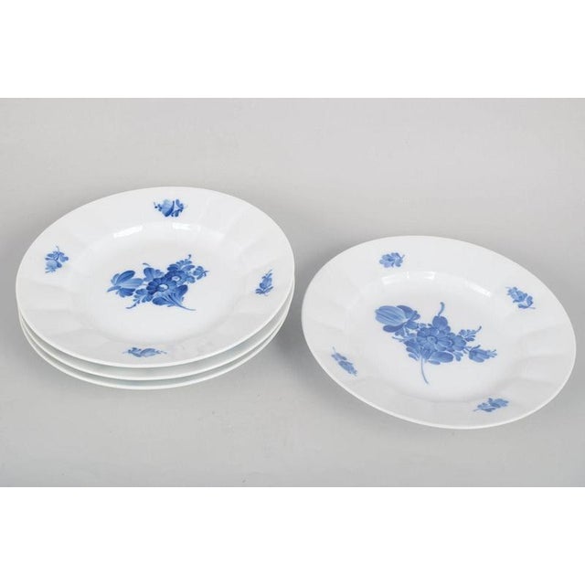 Royal Copenhagen Blue Flower Angular, set of four dinner plates. Set of four dinner plates in hand-painted porcelain from...