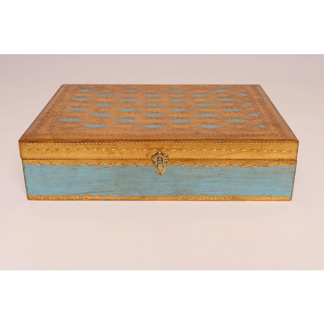 Florentine gilt-wood hinged jewelry/decorative box with hand-painted detail opening to reveal a painted beige interior...