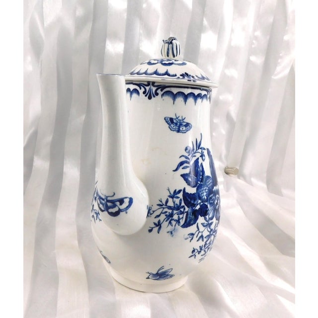 This is not exactly Royal Worcester coffee pot in the Blue Sprays pattern. There are two problems-at least. First, this...