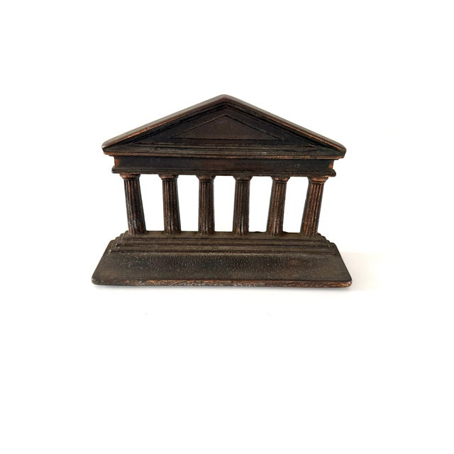 Two cast iron architectural pillars after the Greek Parthenon. Two different sizes, can be used as decor or as bookends....