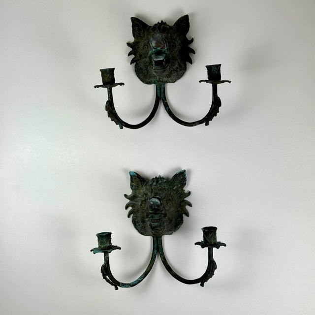 A Majestic pair of heavy cast metal boar heads wall light sconces. These boar ones are rare, as you typically find the...
