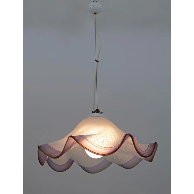 Superb suspension lamp in Murano glass, produced by Murano masters, production technique of blown glass with air bubbles...