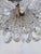Brass Vintage Multi-Tier Crystal Waterfall Chandelier With Ornate Brass Rim For Sale - Image 8 of 9