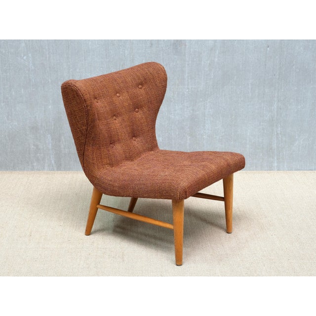 This rare lounge chair was designed by Eric Bertil Karlén and produced by his company Firma Rumsinteriör in Sweden in the...