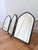 Art Deco tri-fold vanity mirror, English, from the 1920s. This tabletop boudoir mirror features three pointed-arch panels...