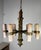 This six-light chandelier is a striking example of rustic, hand-forged craftsmanship with a bold, geometric silhouette....