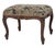 Elegant antique French walnut footstool or ottoman dating to the early 1910s. This charming piece features graceful...