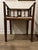 A lovely corner chair with an asian motif cushion