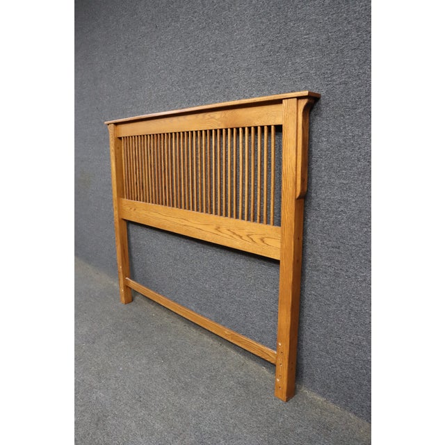 Solid oak queen headboard in a classic mission style with vertical slat design. Clean, simple lines with a warm natural...