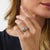 This elegant vintage diamond ring is a beautifully distinctive 1980’s design, featuring 22 carré and round brilliant cut...