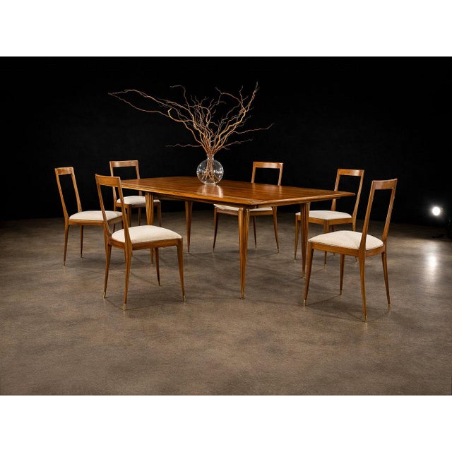 This sculptural set of six dining chairs exemplifies the refined elegance and expressive craftsmanship of Brazilian...