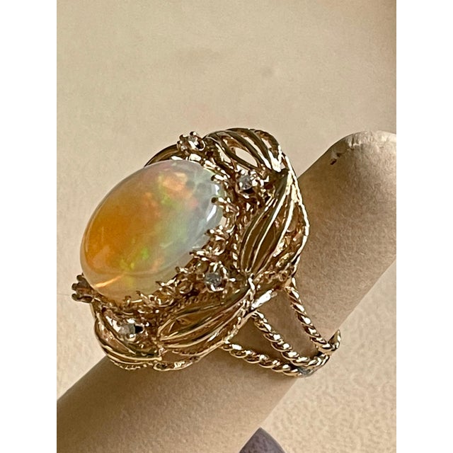 15 Carat Oval Shape Ethiopian Opal Cocktail Ring 14 Karat Yellow Gold Solid Ring For Sale - Image 10 of 18