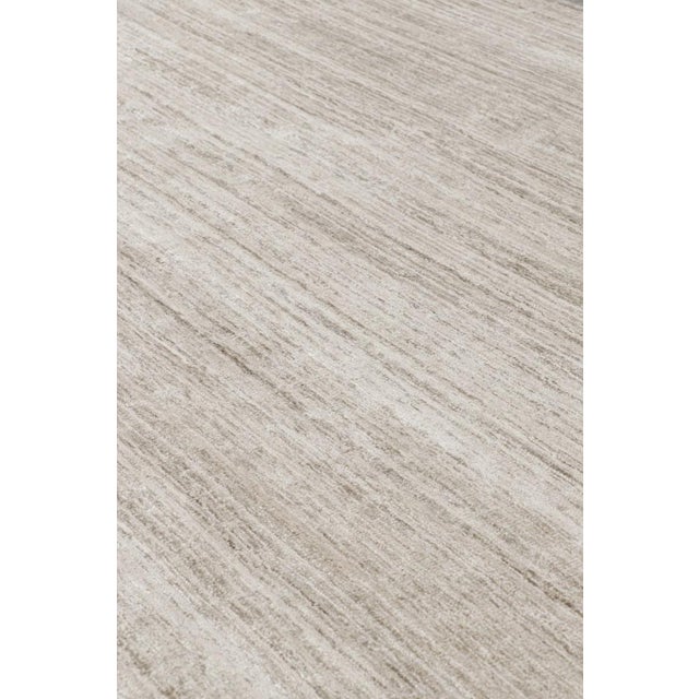 Handmade in art silk, this 13x16 rug is a rich new addition to Rug & Kilim’s Textural rug collection—with an impressive...