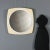 Round wall mirror with white plastic frame. This piece is attributed to the mentioned designer/maker. It has no...
