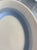 “And I guess that’s why they call it the blues…” Elton John This 12" Art Deco Oval Serving Platter with rings in shades of...