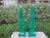 Pair of large carved wood faux Malachite Obelisks. Offered is a stunning pair of Hollywood Regency style carved wood...