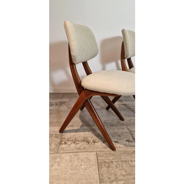 Four Scissor Chairs from Louis van Teeffelen. This piece is attributed to the mentioned designer/maker. It has no...