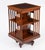 This is an exquisite antique Edwardian inlaid flame mahogany revolving bookcase, circa 1900 in date. It revolves on a...