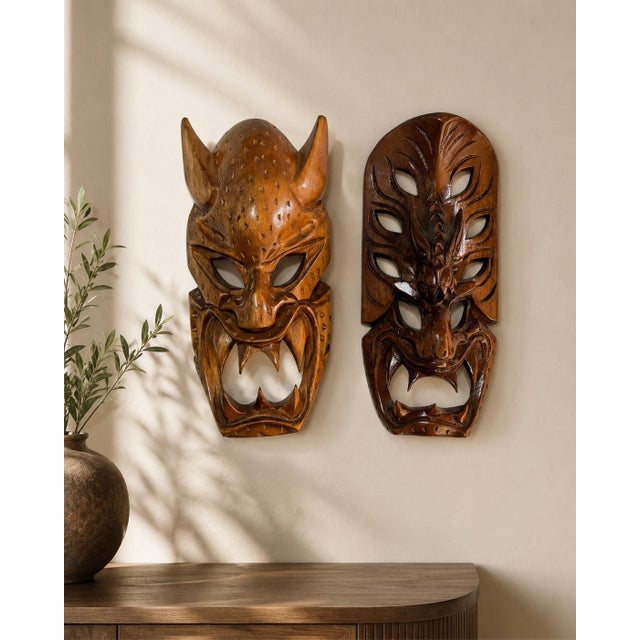 Pair of Vintage Philippine Hand-Carved Monkey Pod Wood Dragon & Demon Wall Masks A wonderfully expressive pair of vintage...