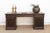 This monumental 72-inch executive desk is a rare masterpiece of Anglo-Indian furniture, representing the pinnacle of the...