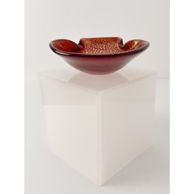 A decorative Murano glass dish, attributed to Murano glass maestro Archimede Seguso. Handcrafted in Italy in the 1950s,...