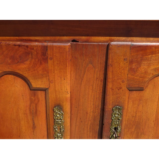 19th-century piece of furniture, a very old solid oak sideboard, entirely pegged. The top is made of interlocking oak...