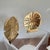 Pair of solid brass sand dollar bookends. Polished to a high gloss shine with a coat of lacquer so the polished look is...