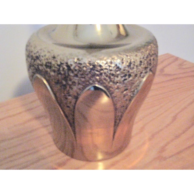 Midcentury Tempestini Brutalist lamp made by the Laurel Lamp Company in the 1960s in a burnished brass. This beautiful...