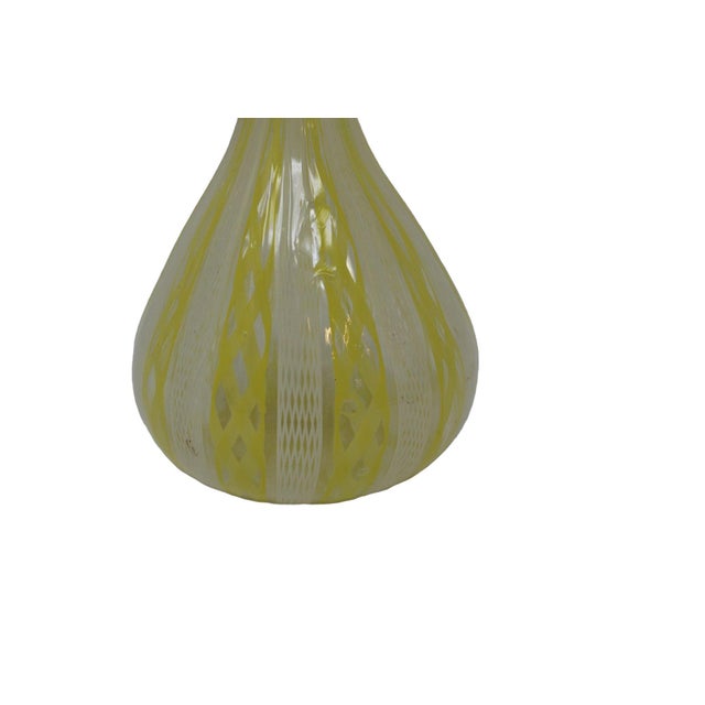 Very rare color of vintage Murano Glass. This beautiful yellow example of Filligrana is an ideal accent piece, but also a...