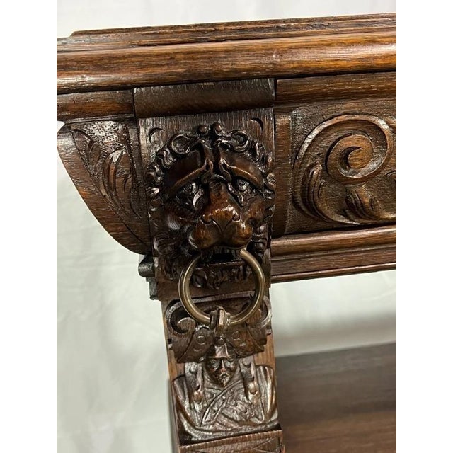 Antique 1880's ornately carved English oak dessert/bar server with lion head motifs and decorative scrolling on the legs...