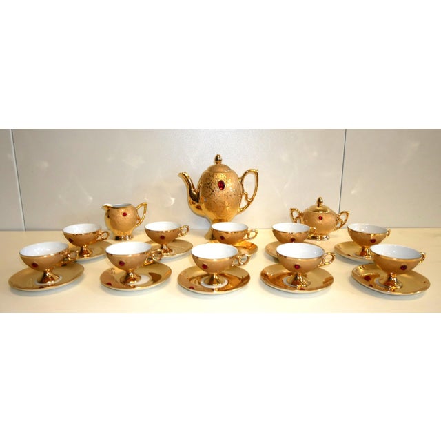 Antique porcelain and pure gold coffee set, 1950s Pure gold-gilded porcelain coffee set Marked Bavaria "Rieber...