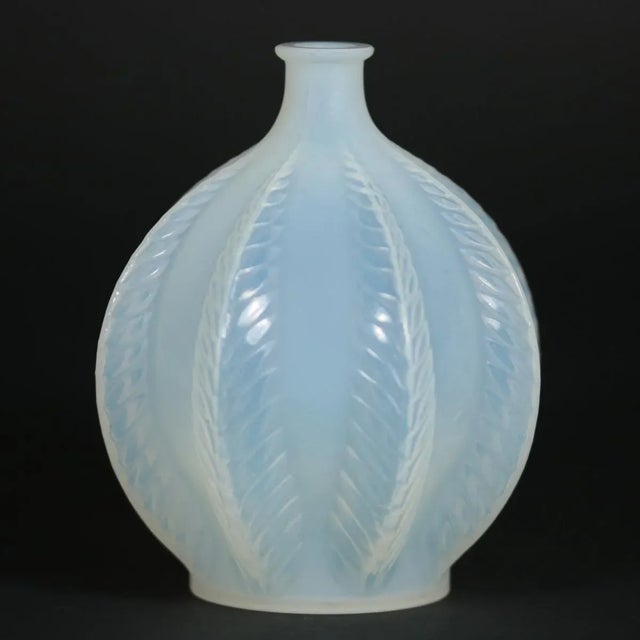 Rene Lalique opalescent glass 'Malines' vase. Pattern features fern fronds, climbing up the sides. Stencilled makers mark,...