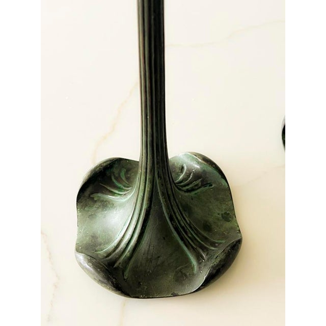 A Pair of Bronze Arts & Crafts - Art Nouveau candlesticks . In the style of Jessie Preston ( Chicago ), perhaps a student?...