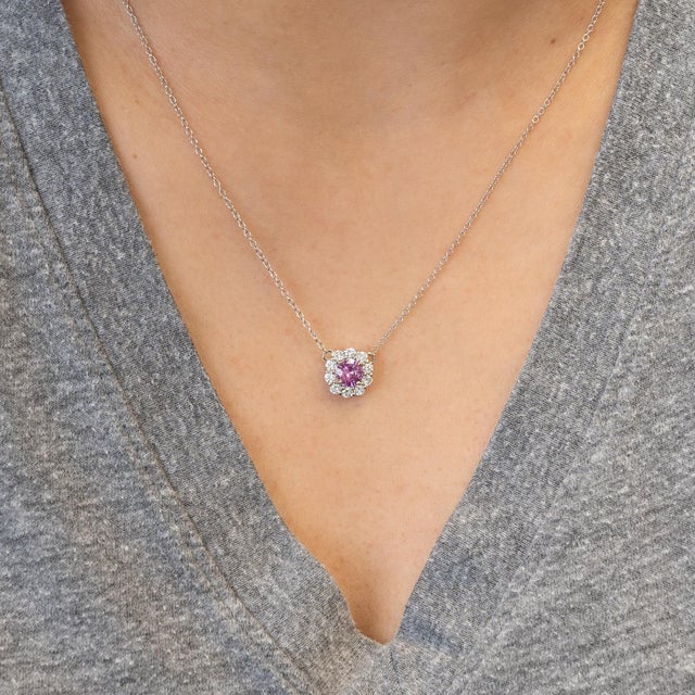 Elegant 6mm pink sapphire pendant necklace crafted in solid 14K gold, showcasing the gemstone’s brilliant color and...