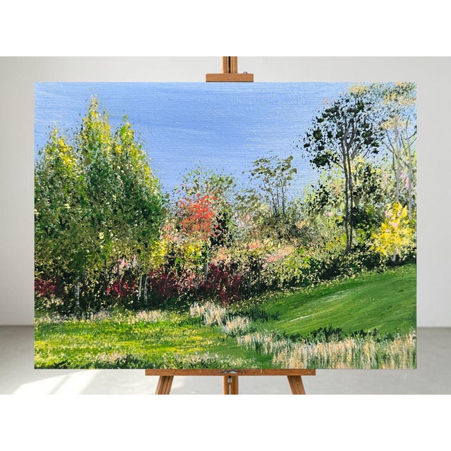This original acrylic painting captures a serene natural landscape with rich details. It features colorful trees and...
