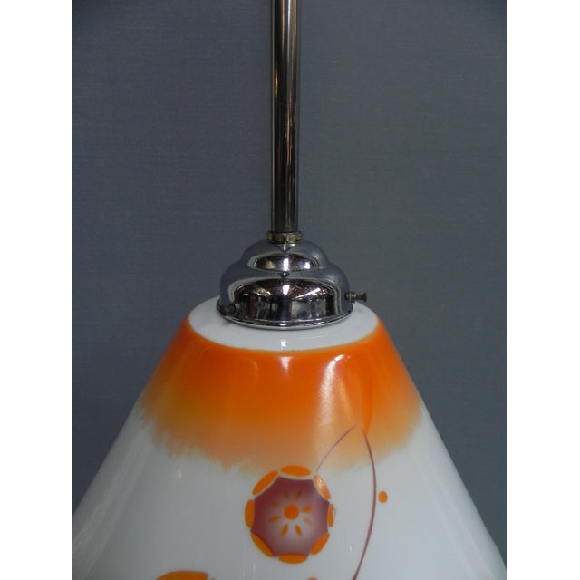 Total length: 77 cm. Ø glass shade: 26 cm. Height of shade: 15 cm. The lamp is equipped with a wide lamp socket (E27) and...