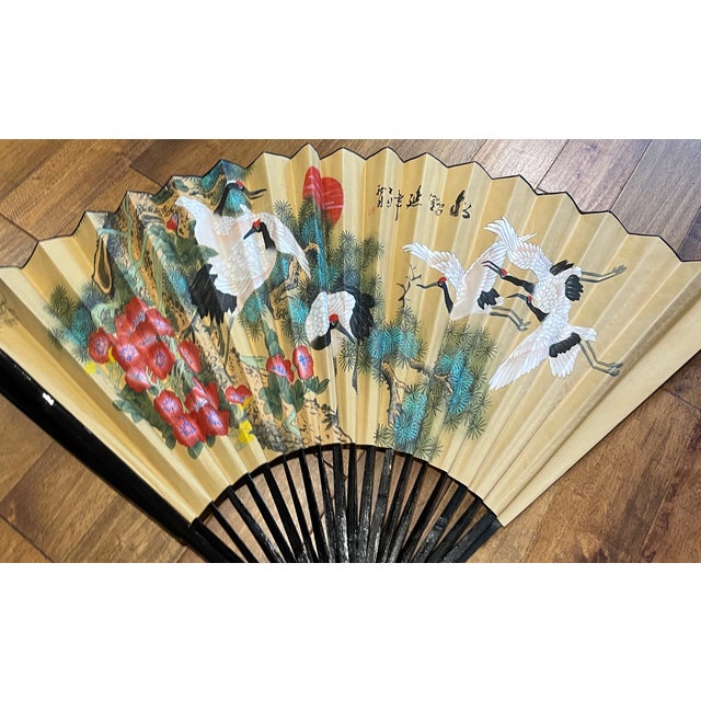 Large Chinese stork or egretl wall fan from the 1970s. Constructed of heavy paper and wood, with silkscreen art work....