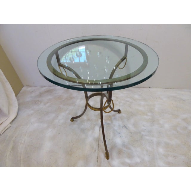 This steel and brass base has a .75" thick glass top.