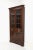 An extra tall Chippendale style corner cabinet by Benbow's of Greensboro, North Carolina, USA. Solid mahogany with wood...