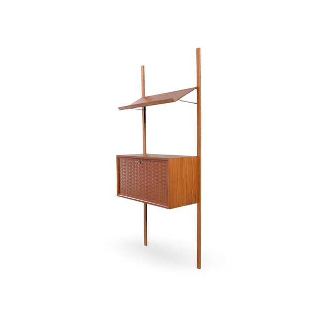 Beautiful, large wall shelf from the traditional Danish manufacturer Cado, dating from the 1960s, for sale. Designed by...