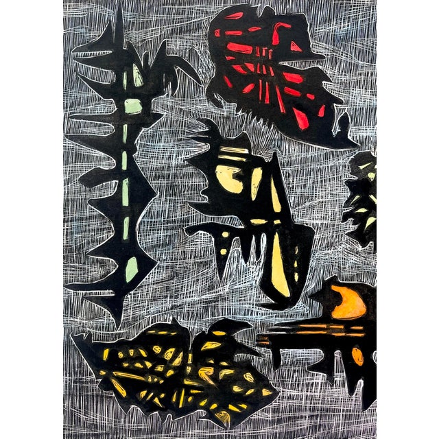 Wood block print titled “Ancient Junks” by Ruth Leaf (1928-2015). Vibrant shades of yellow, red, green and orange, on a...