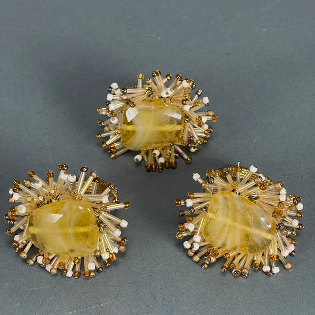 Beautiful 50's era rare beaded glass napkin rings in rich jewel tones. All 5 napkin rings are extremely well made, with a...