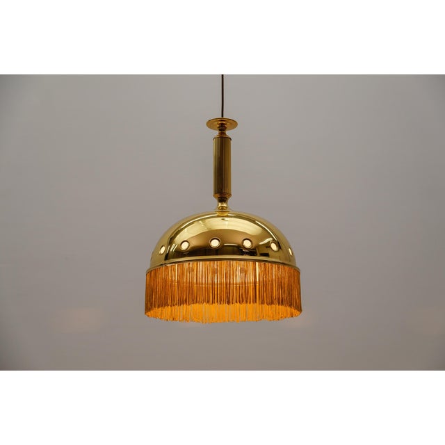 Lovely brass & silk fringes attrib, to Hans-Agne Jacobssen, 1960s We have two identical lamps, though they show slight...