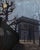 The painting depicts the iconic Arc de Triomphe shrouded in a quiet, atmospheric twilight, with skeletal trees lining a...