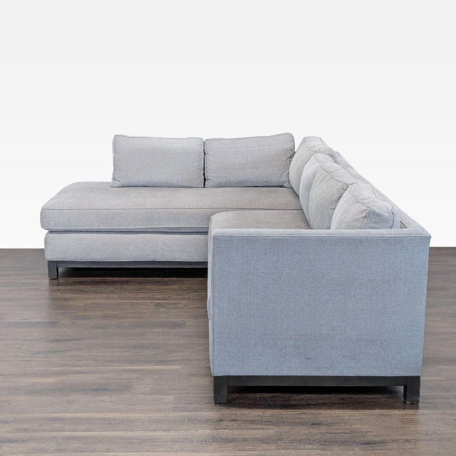 This Mitchell Gold + Bob Williams sectional offers a sleek, modern look in a versatile gray fabric. It features deep...