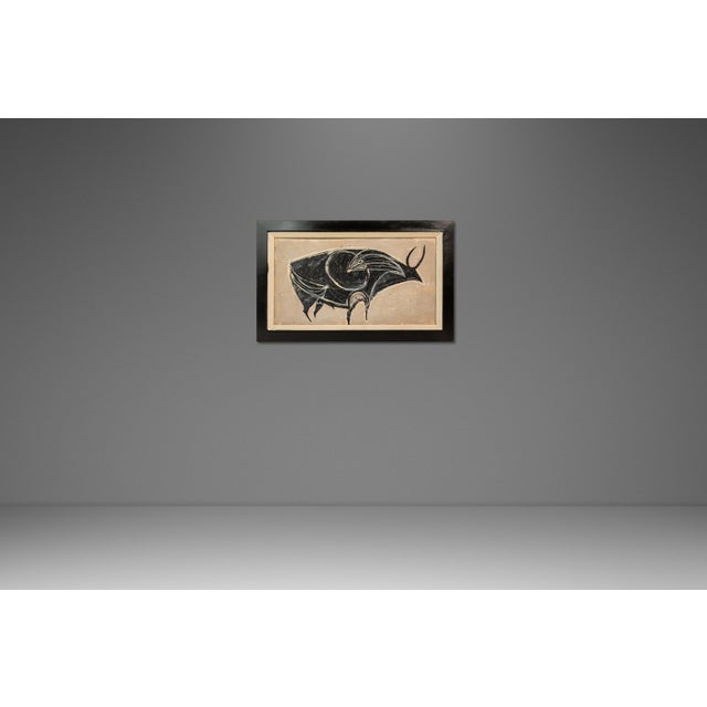 Introducing a captivating oil on canvas painting depicting a robust bull. Blending both Abstract and Mid-Century Modern...